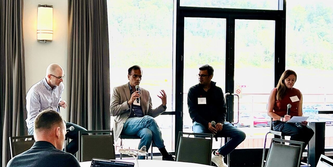 Vishal Sood speaking on the Building in the GenAI Era panel at the Madrona Builders Summit, Museum of Flight, Seattle